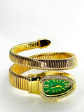 women`s Gold snake wrap watch.