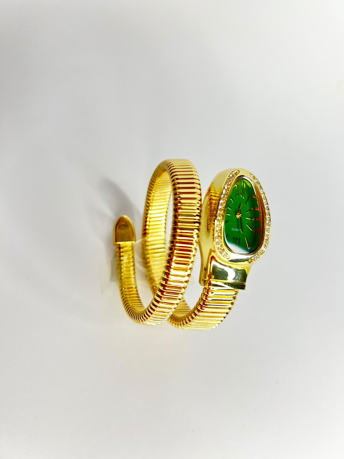 women`s Gold snake wrap watch.